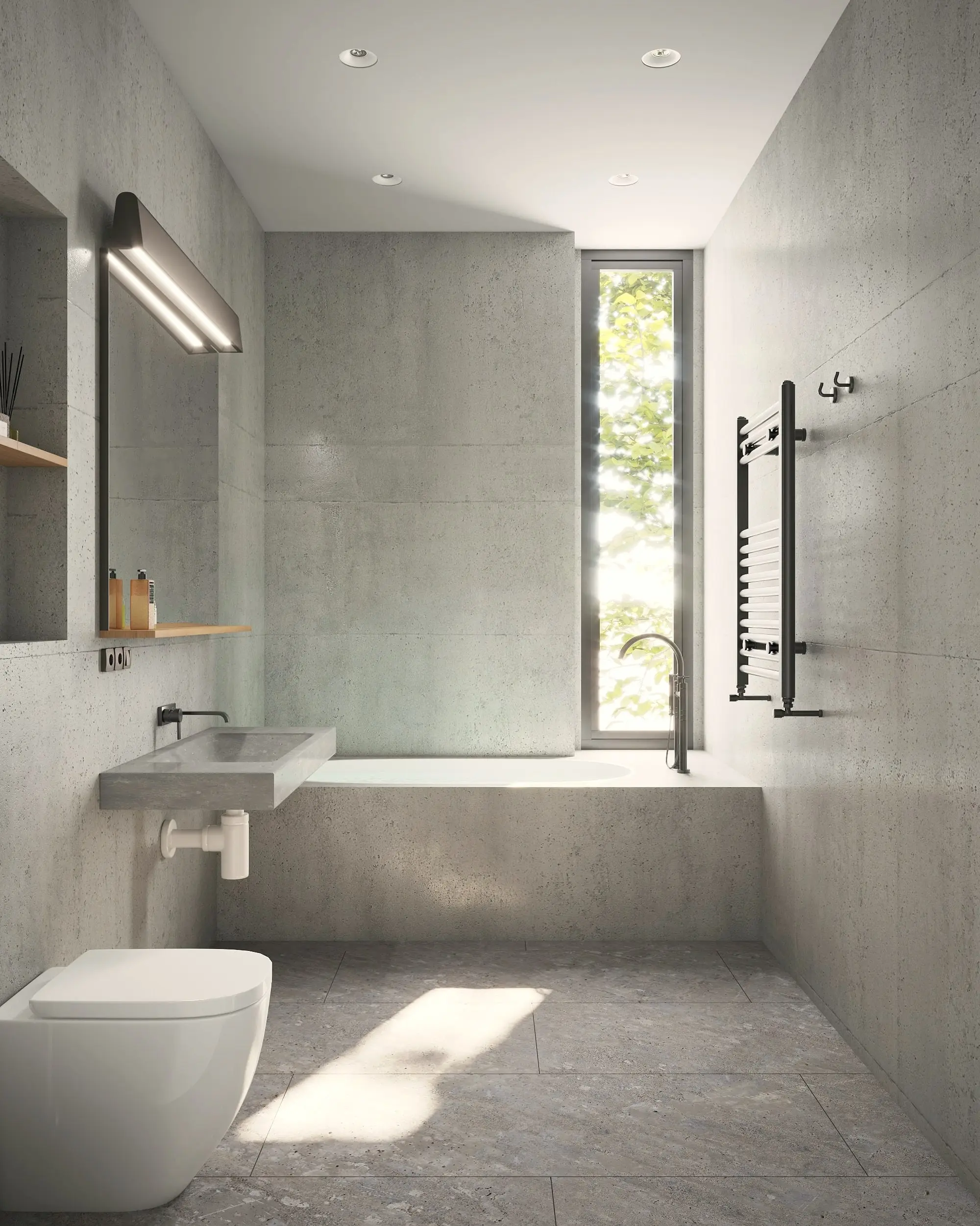 Baño reformado, acabado en microcemento y con la bañera junto a la ventana